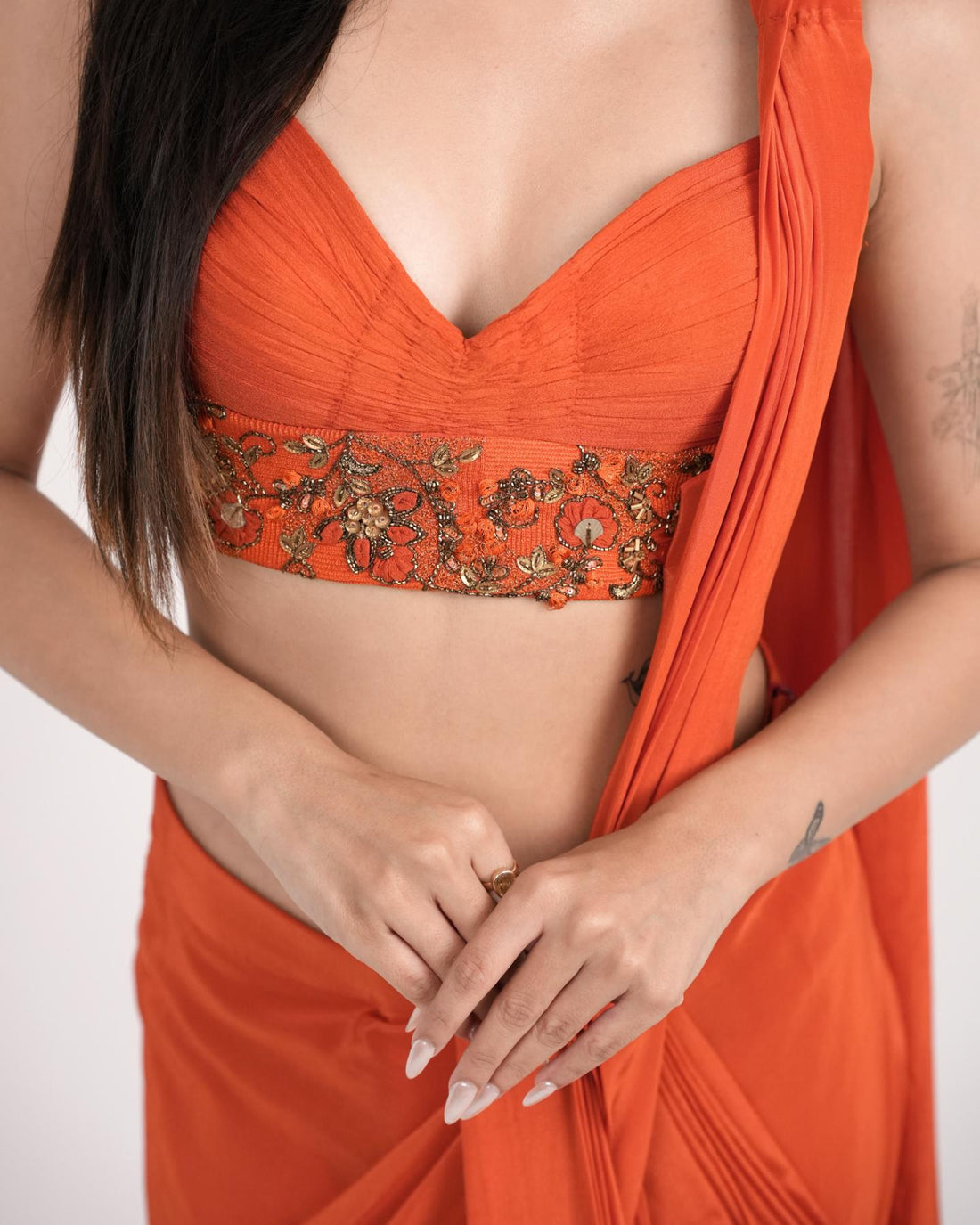 Bright Orange hand embroidered pre-draped saree