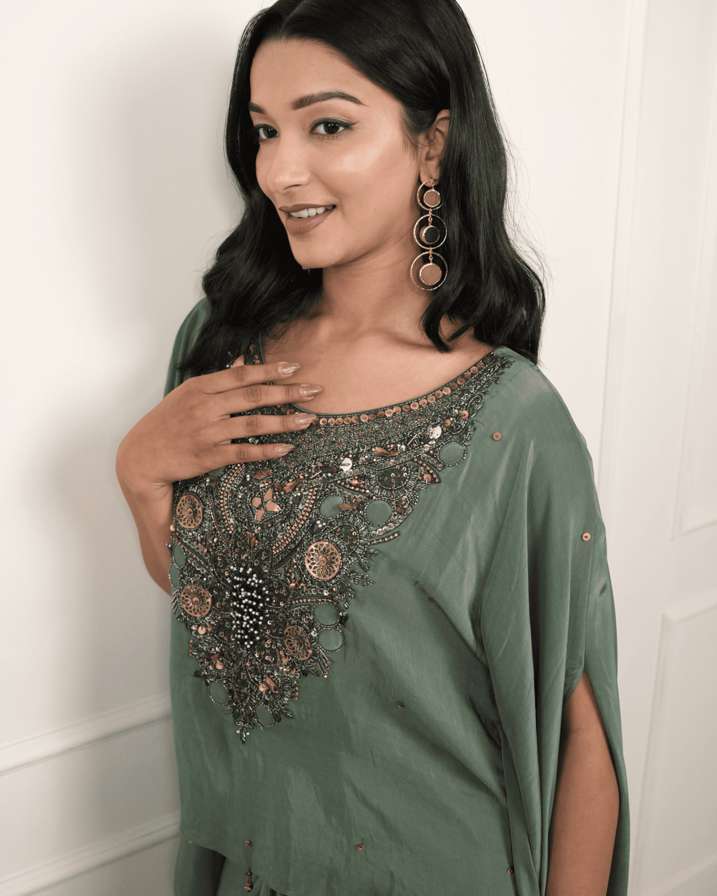 Dark green hand embroidered kaftan with drape skirt