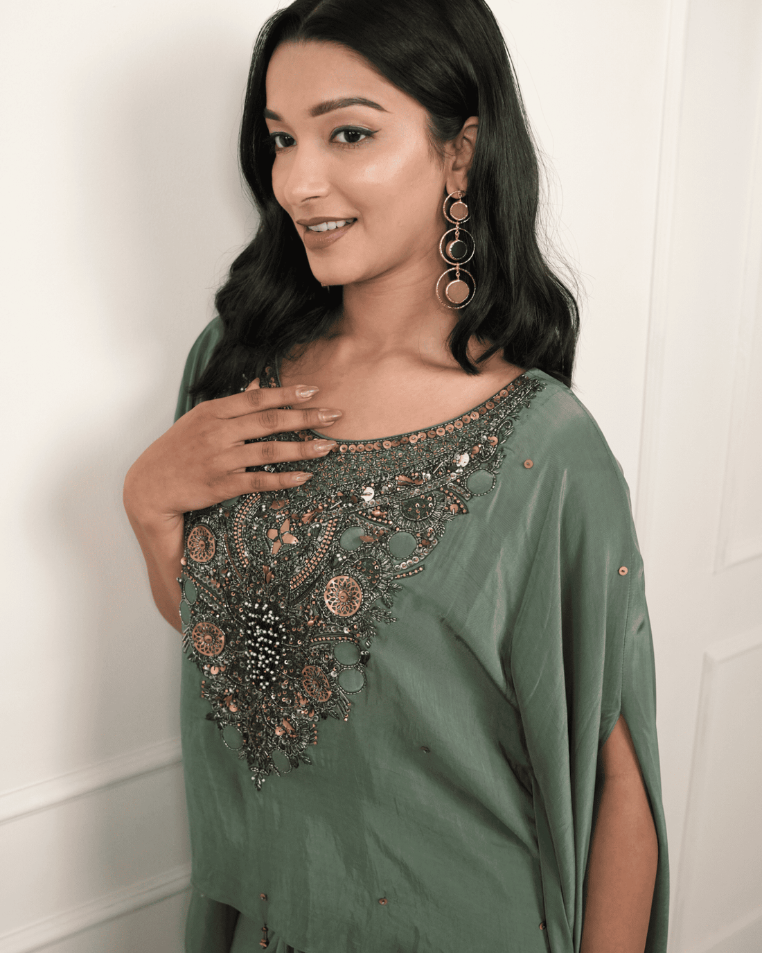 Dark green hand embroidered kaftan with drape skirt