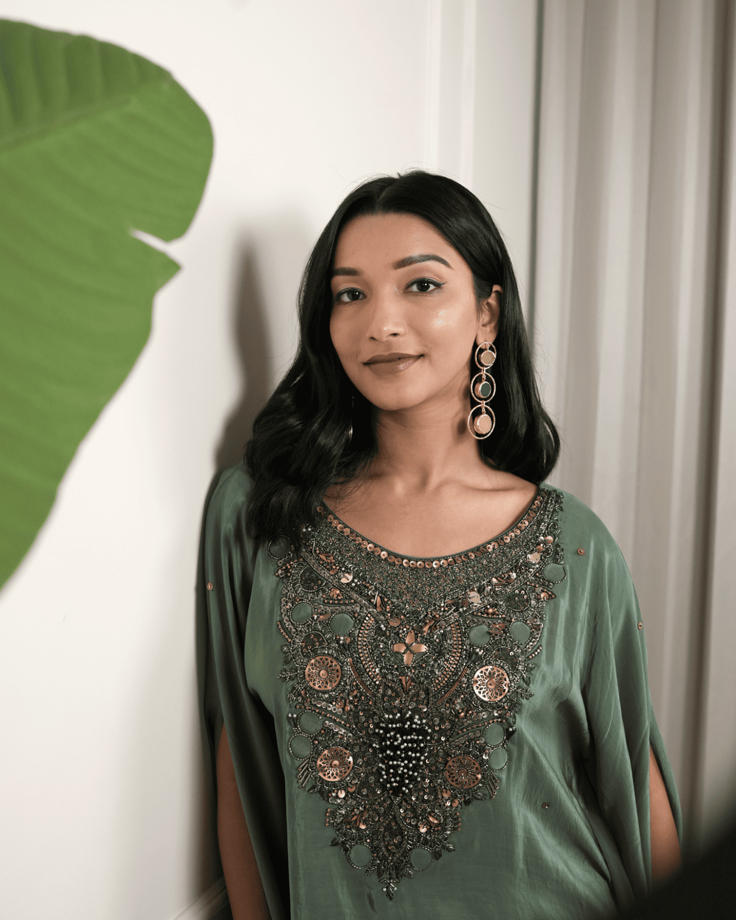 Dark green hand embroidered kaftan with drape skirt