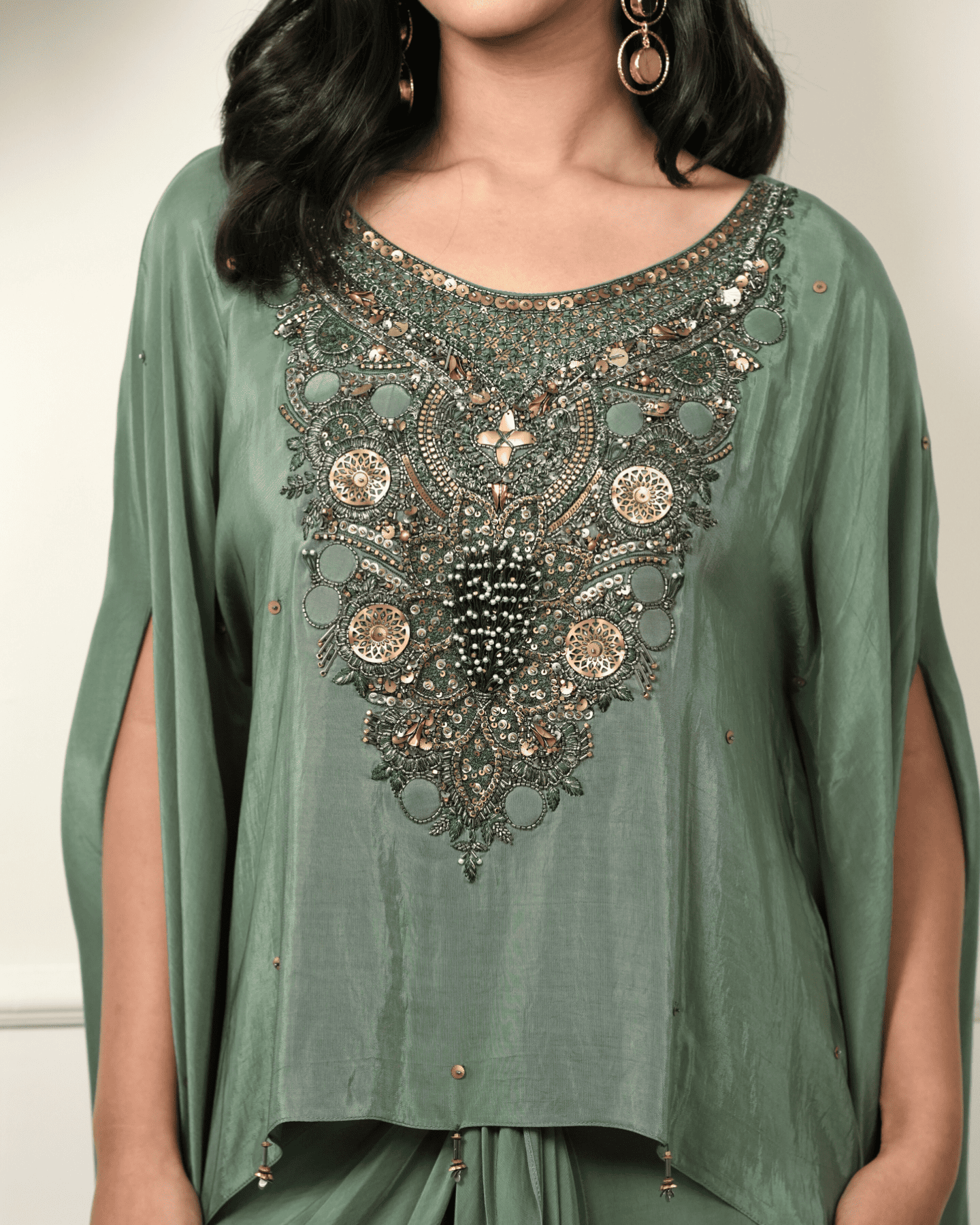 Dark green hand embroidered kaftan with drape skirt
