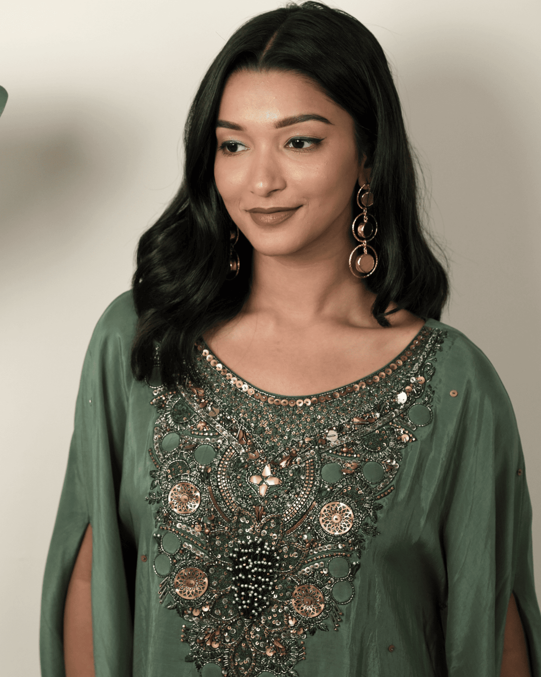 Dark green hand embroidered kaftan with drape skirt