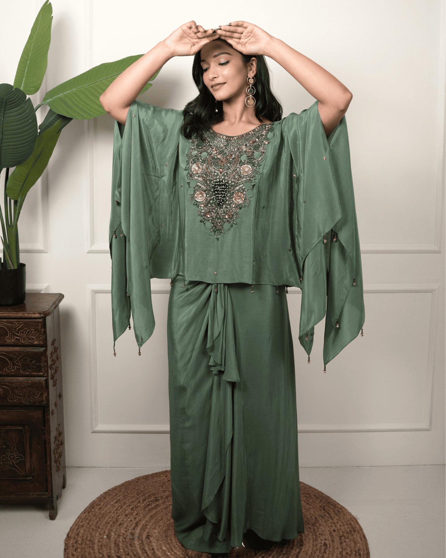 Dark green hand embroidered kaftan with drape skirt