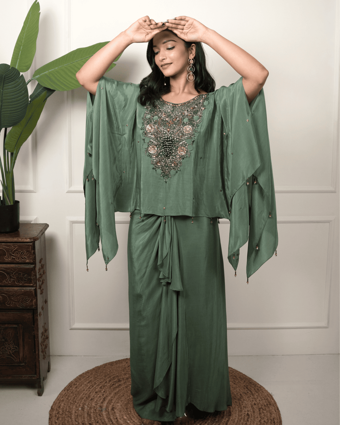 Dark green hand embroidered kaftan with drape skirt